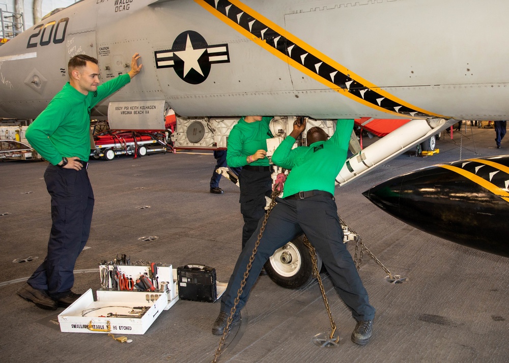 Sailors preform maintenance