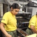 USS George H.W. Bush (CVN 77) Sailor cooks for the crew.