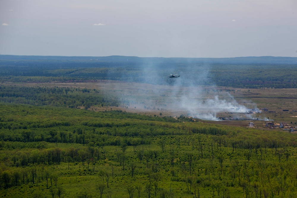 Marines with Marine Light Attack Helicopter Squadron (HMLA) 167 support exercise Northern Strike 22-2