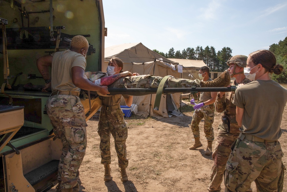 1171st Medical Company Area Support Offload Roleplaying Patients During a Mass Casualty Simulation at Northern Strike 22-2