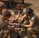 1171st Medical Company Area Support Strap Down a Roleplaying Patient During Northern Strike 22-2