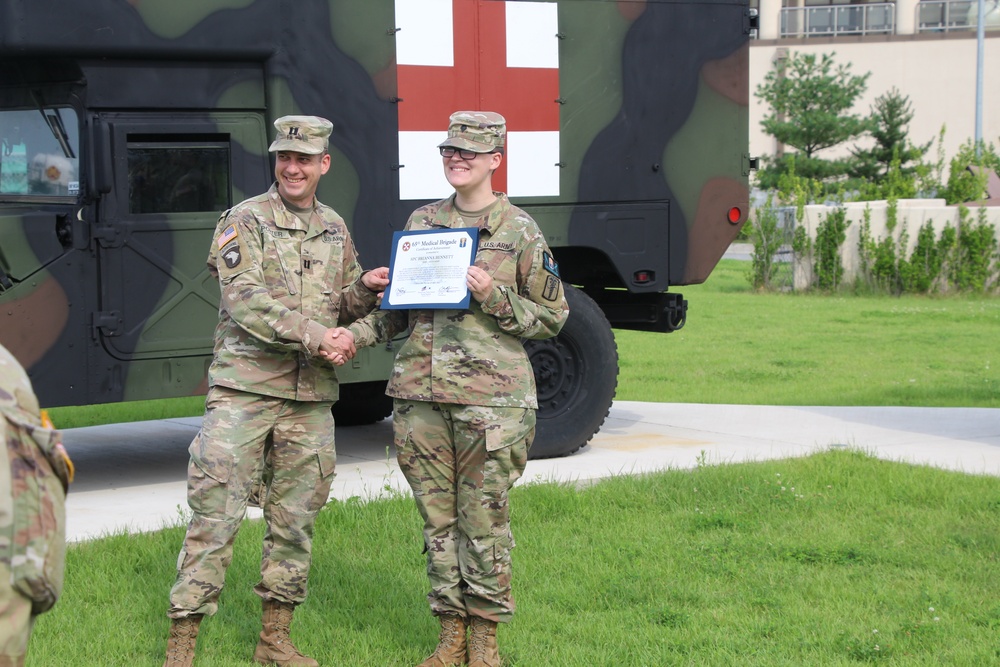 Spc. Brianna Bennet receives COA