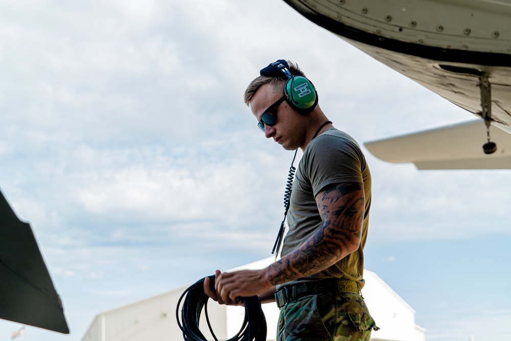 Crew chief conducts preflight inspection of KC-135