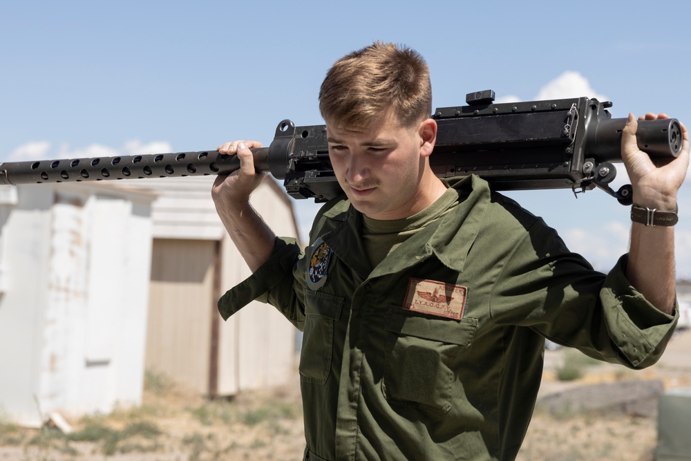 Marines with Marine Heavy Helicopter Squadron (HMH) 461 clean machine guns