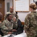 Human Resource Soldiers Discuss Reports