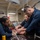 USS Ronald Reagan (CVN 76) Sailors pack and prepare parachutes USS Ronald Reagan (CVN 76) Sailors pack and prepare parachutes