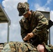 Marines with CLB- 4 conduct Tactical Combat Casualty Care training, machine gun range