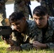 Marines with CLB- 4 conduct Tactical Combat Casualty Care training, machine gun range