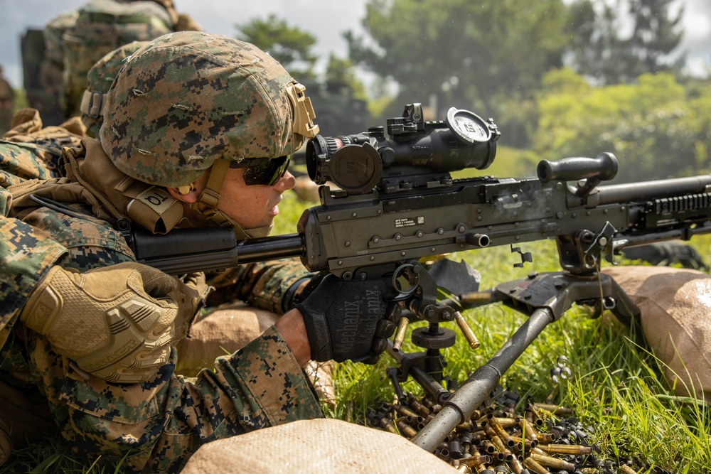 Marines with CLB- 4 conduct Tactical Combat Casualty Care training, machine gun range