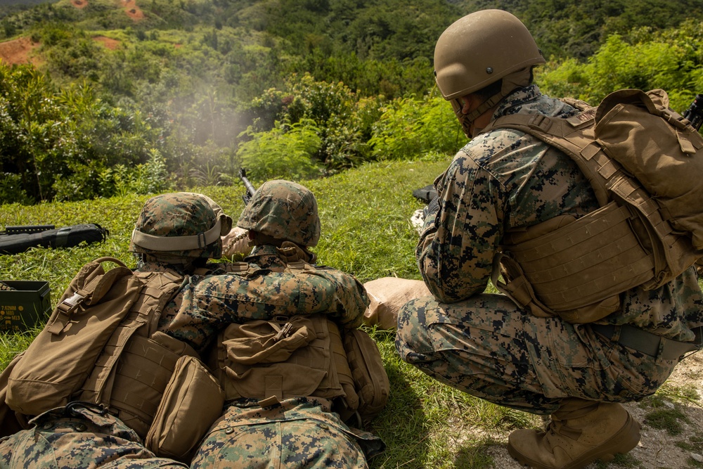 Marines with CLB- 4 conduct Tactical Combat Casualty Care training, machine gun range