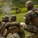 Marines with CLB- 4 conduct Tactical Combat Casualty Care training, machine gun range