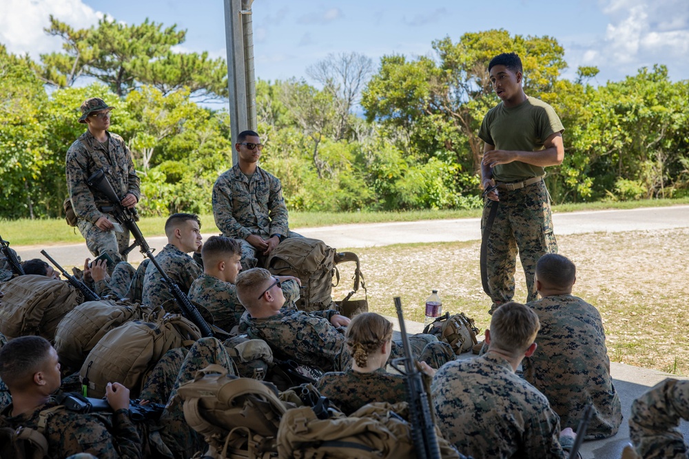 Marines with CLB-4 conduct Tactical Combat Casualty Care training, machine gun range