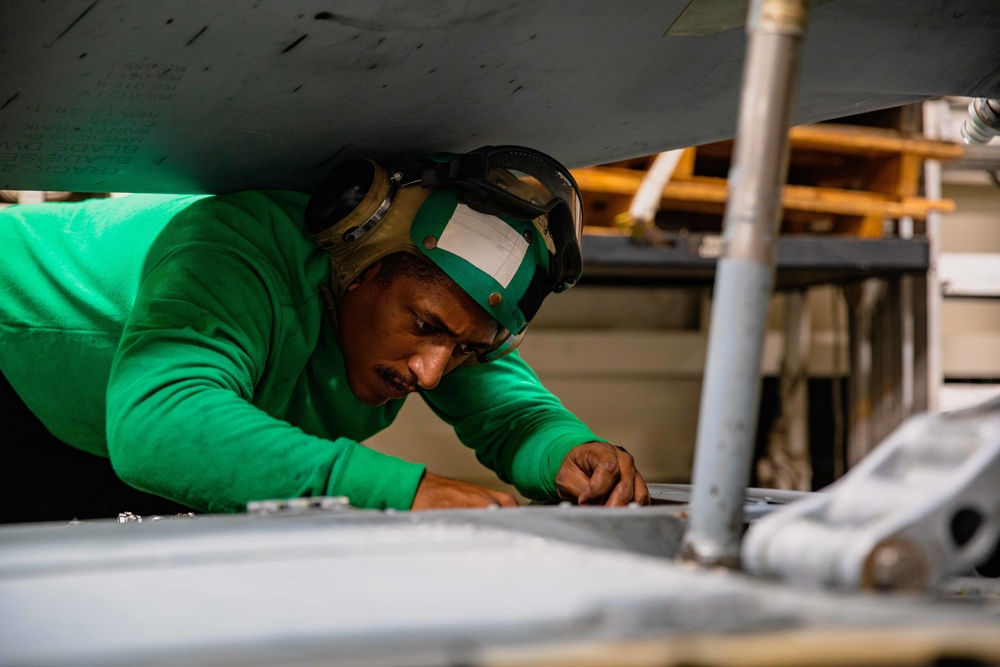 HSM 79, DET 2 Sailors Conduct Checks on MH-60R Aboard DDG 117