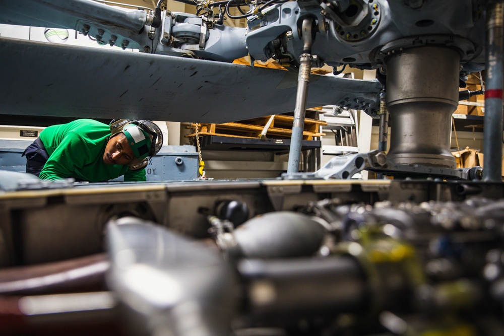 HSM 79, DET 2 Sailors Conduct Checks on MH-60R Aboard DDG 117