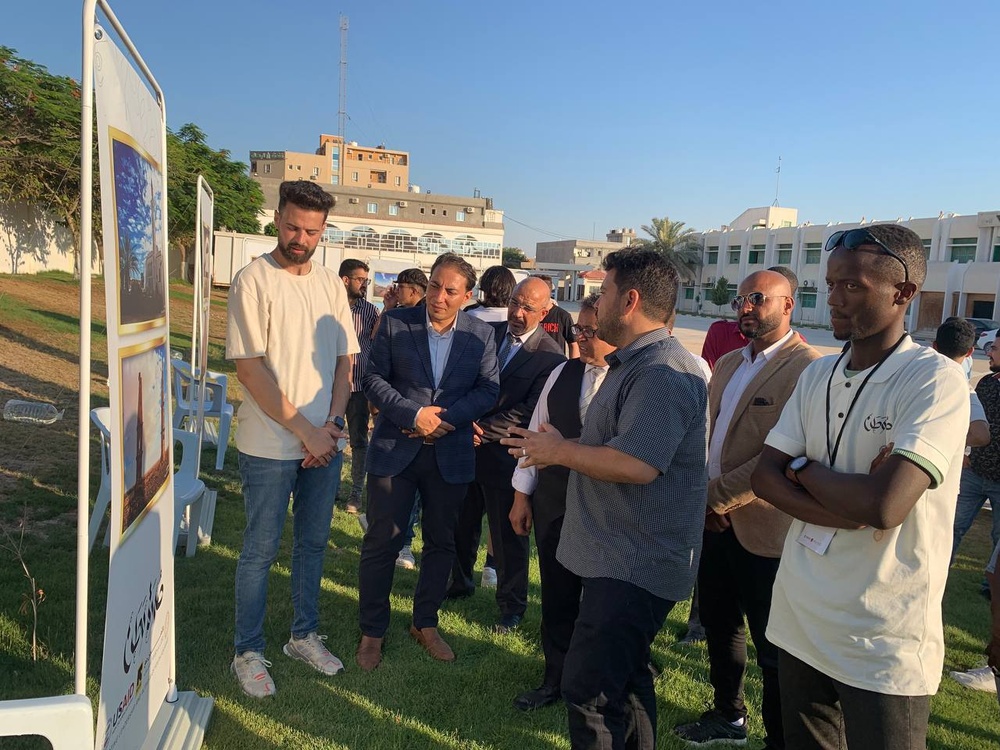 Participants enjoy  Our Nation’s Identity Photo Exhibit in Misrata.
