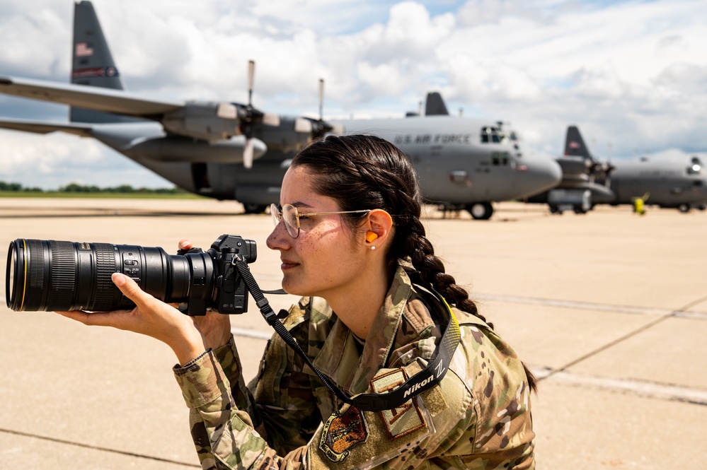 Airman 1st Class Avery Litton photographing C-130 Hercules aircraft Aug. 14, 2022