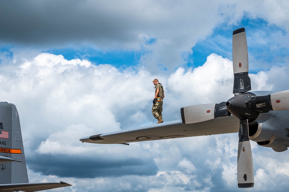 182nd Aircraft Maintenance Squadron maintainers working on C-130 Hercules aircraft Aug. 14, 2022