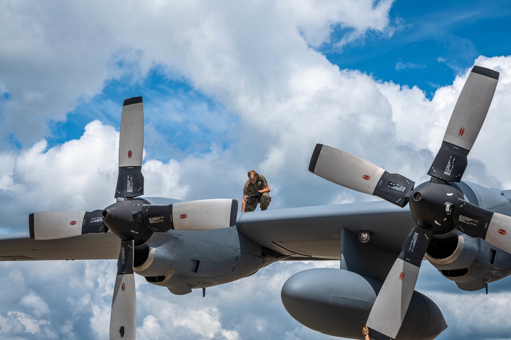182nd Aircraft Maintenance Squadron maintainers working on C-130 Hercules aircraft Aug. 14, 2022