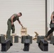 Marines with Marine Heavy Helicopter Squadron (HMH) 461 prepare ammo