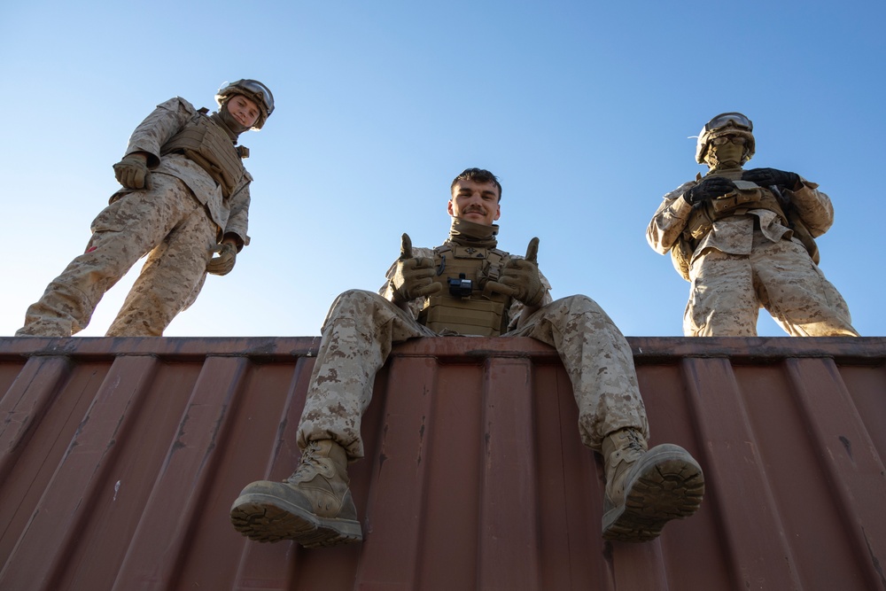 Marines with 2nd Landing Support Battalion help with heavy lifting
