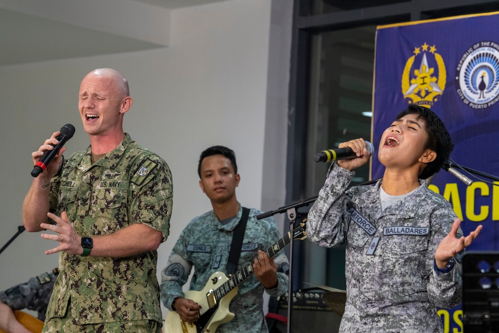 Musicians from U.S. Pacific Fleet, Royal Australian Navy, and Philippine Air Force perform during Pacific Partnership 2022