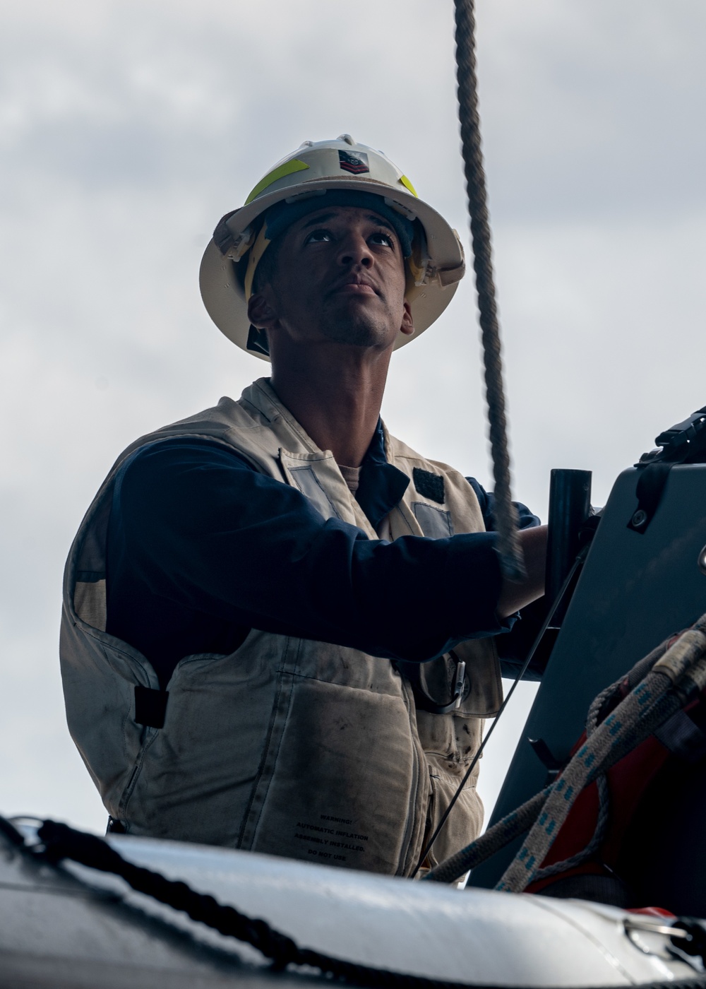 Sailors conduct boat operations