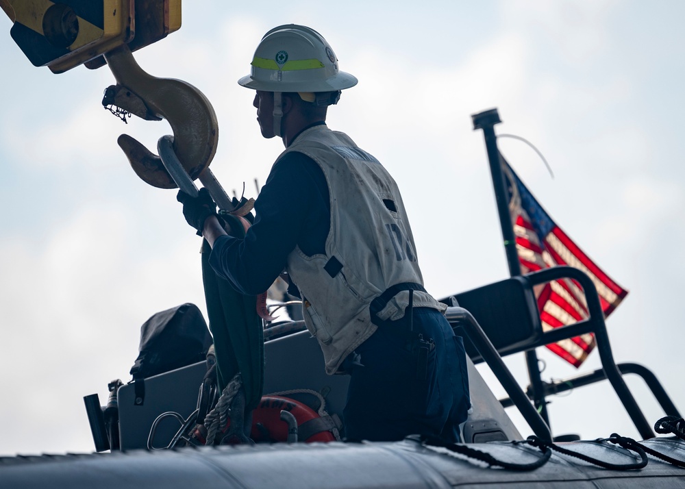 Sailors conduct boat operations