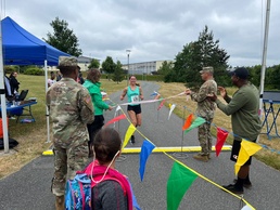 One of the fastest female Soldiers in Europe crosses the finish line