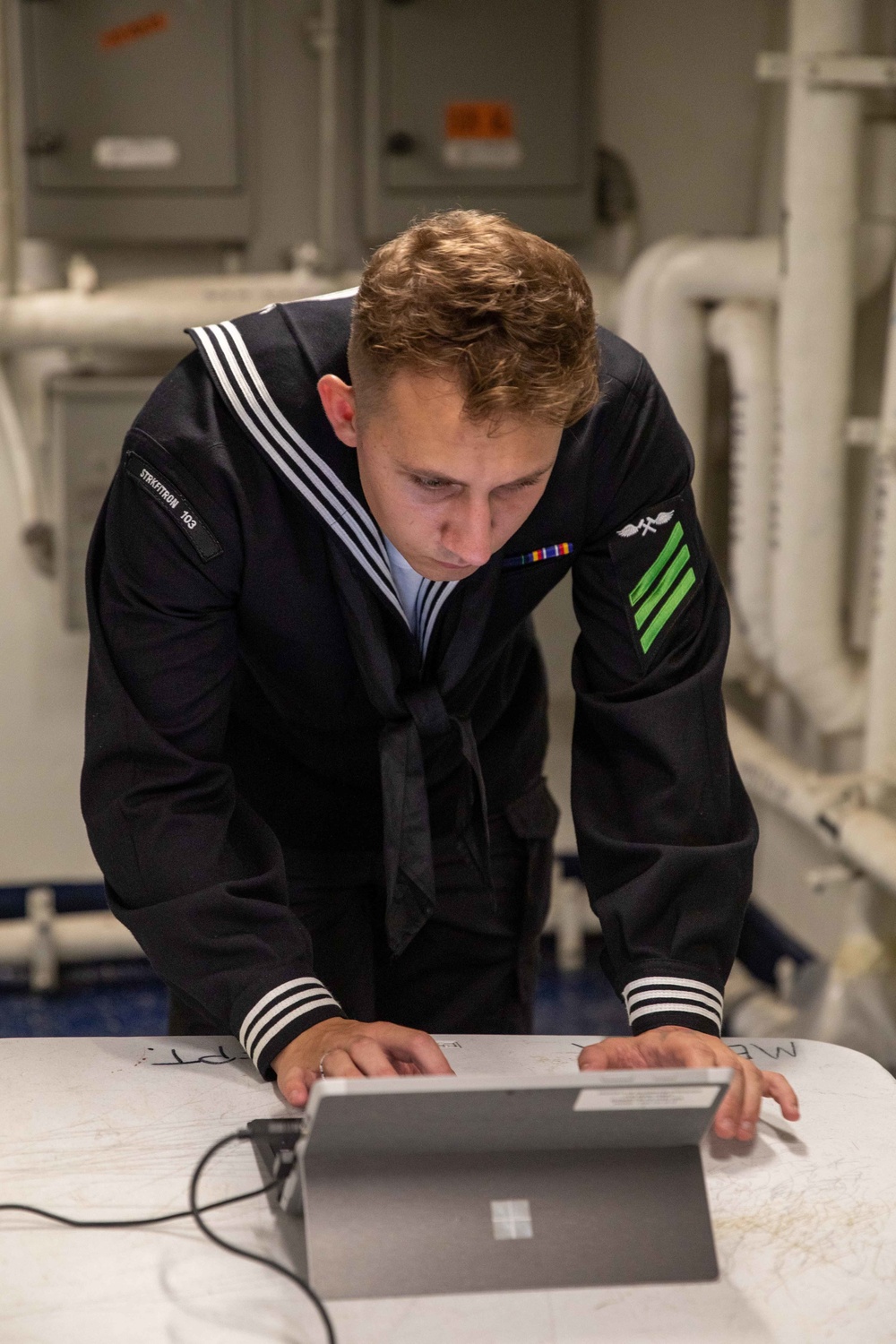 USS George H.W. Bush Sailors Take Cruisebook Portraits