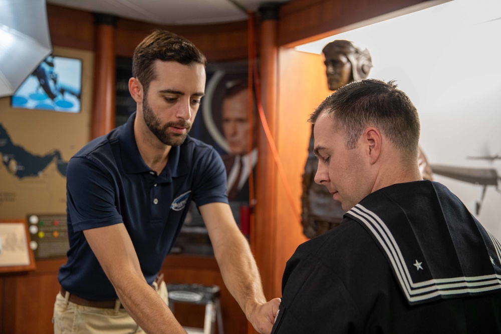 USS George H.W. Bush Sailors Take Cruisebook Portraits