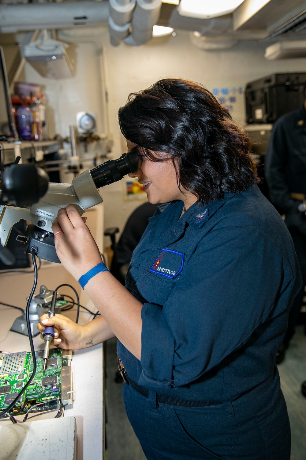 USS George H.W. Bush (CVN 77) Sailor Solders Electrical Equipment