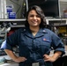 USS George H.W. Bush (CVN 77) Sailor Poses for Award Photo.