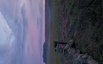 Live fire under a lavender sky on Cape Cod