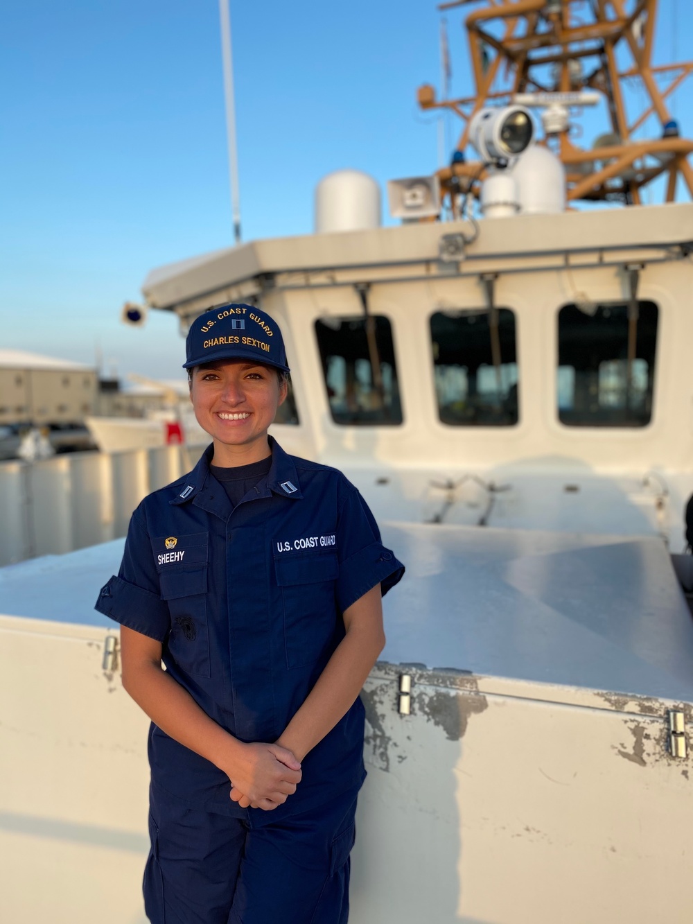 Commanding Officer Stands Aboard Coast Guard Cutter Charles Sexton