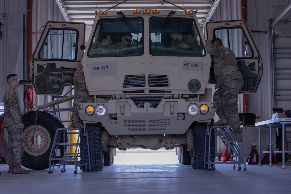 Soldiers Complete a Preventative Maintenance Checks and Services