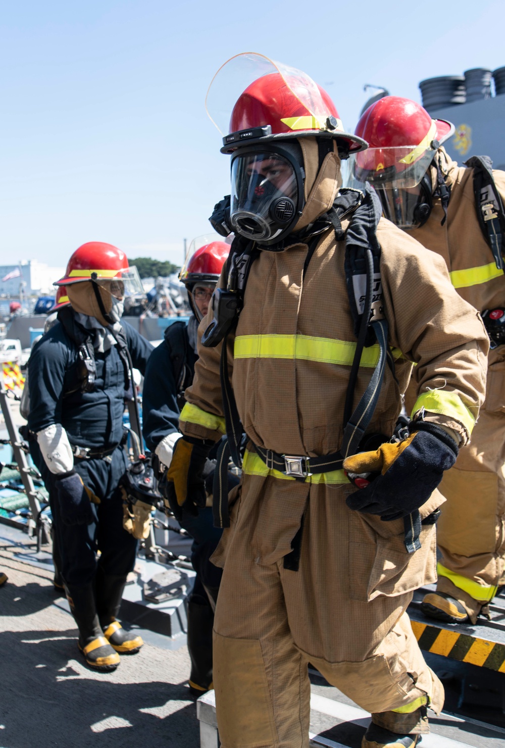 USS Dewey Sailors conduct fire drill with base firefighters