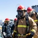 USS Dewey Sailors conduct fire drill with base firefighters