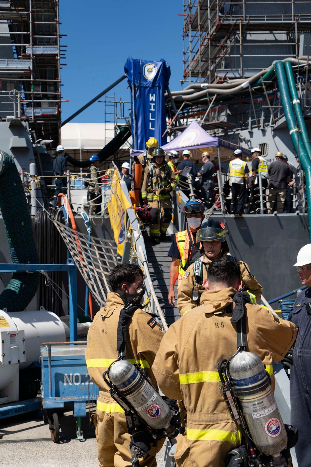 USS Dewey Sailors conduct fire drill with base firefighters