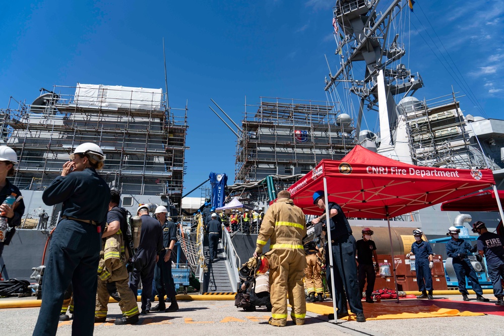 USS Dewey Sailors conduct fire drill with base firefighters