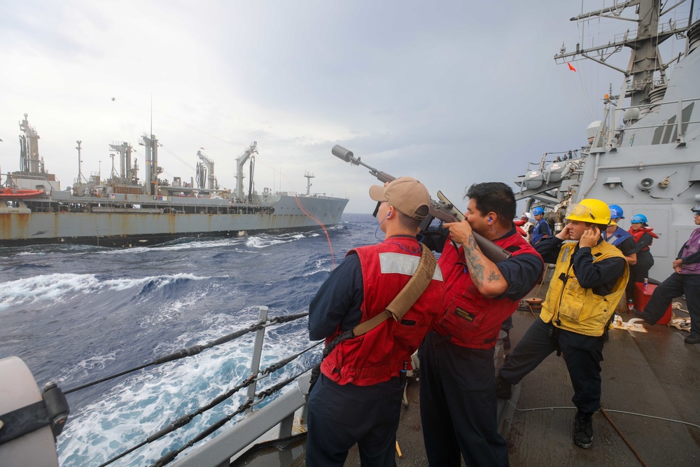 USS Cole Conducts a replenishment at sea with USNS Kanawha