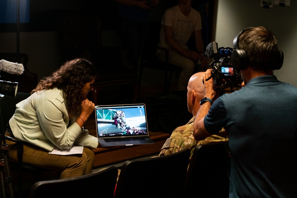 France Television reporters interview OAR Aerial Mission Commander