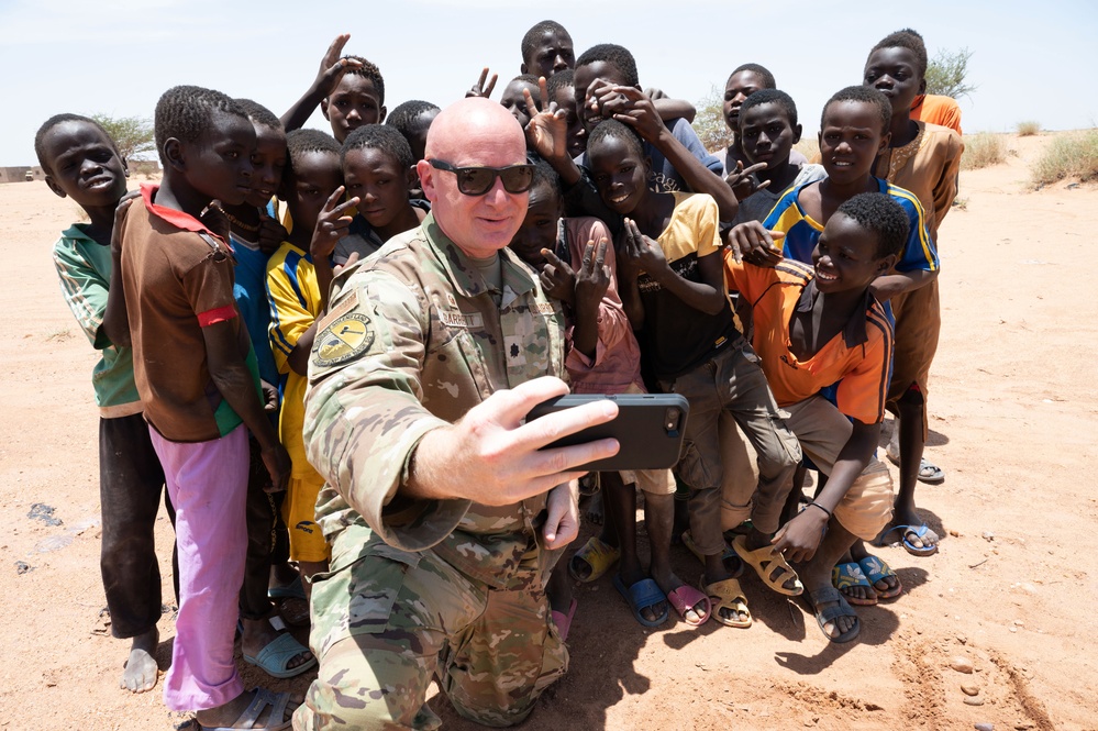 U.S. military members spend time with local Nigerien children