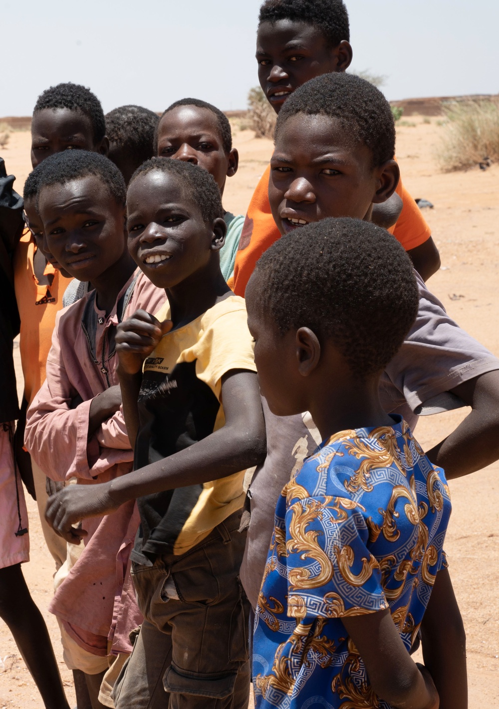 U.S. military members spend time with local Nigerien children
