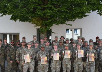 In the spirit of marksmanship training and partnership, the 6. Feldjaeger Regiment 3 from Bruchsal, Germany, hosted Public Health Command Europe soldiers in a Schutzenschnur, German marksmanship, shooting event Aug. 9.