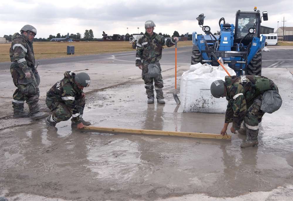 100th CES simulate repair of damaged runway during CBRNE exercise