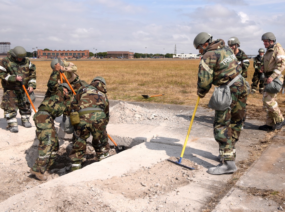 100th CES simulate repair of damaged runway during CBRNE exercise