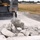 100th CES simulate repair of damaged runway during CBRNE exercise 100th CES simulate repair of damaged runway during CBRNE exercise