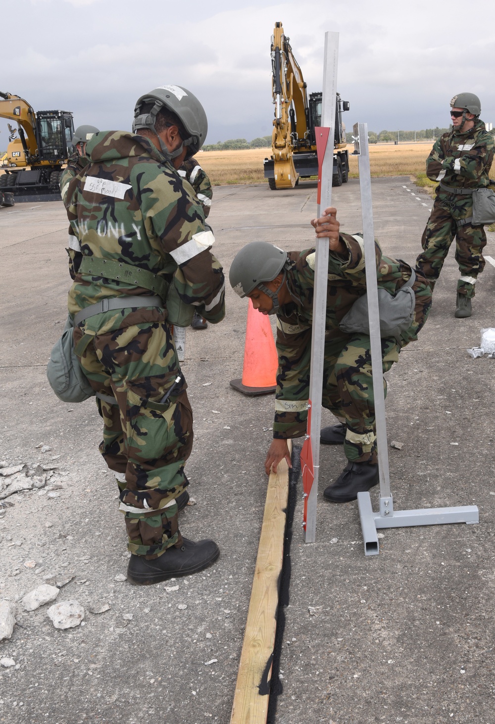 100th CES simulate repair of damaged runway during CBRNE exercise