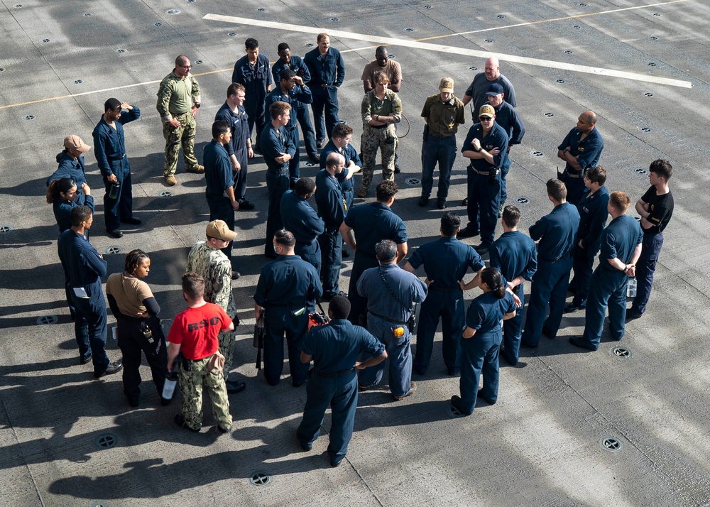 Sailors fire M2A1 .50 caliber machine gun