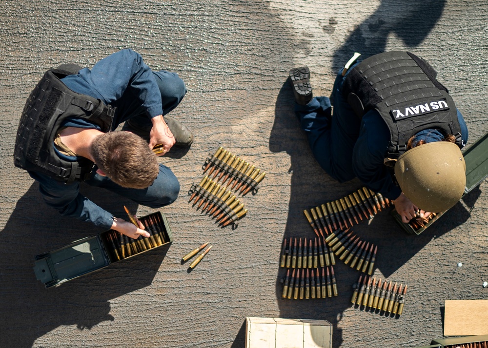 Sailors fire M2A1 .50 caliber machine gun